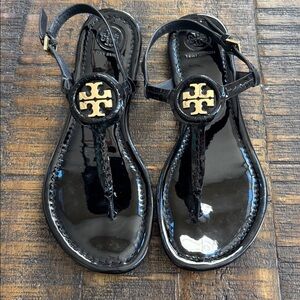 Tory Burch Black Patent Leather Sandals with Gold Emblem